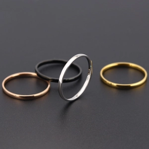 Minimalist titanium steel ring set in gold, silver, black, and rose gold finishes