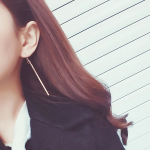 Minimalist long bar drop earrings in polished gold finish for women's elegant style