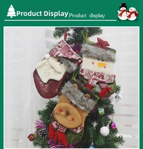 Three 3D Christmas stockings featuring Santa, snowman and reindeer on a tree