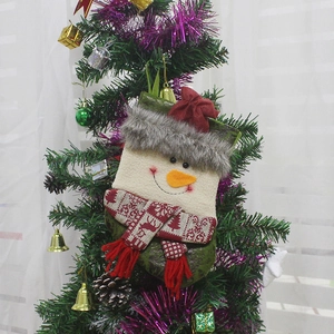Festive beige snowman Christmas stocking with faux fur cuff and red knit scarf detail