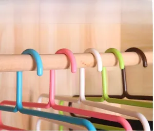 Detail of multi-layered hangers made of durable PP material in various bright colors