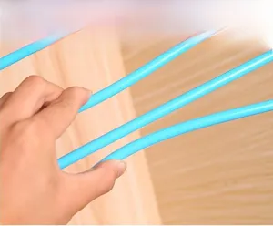 Macro shot of flexible blue 5-tier pants rack showing durable and bendable material