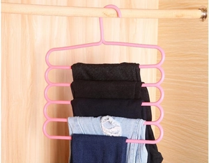 Pink 5-tier multi-functional pants hanger in closet for scarves and trousers organization