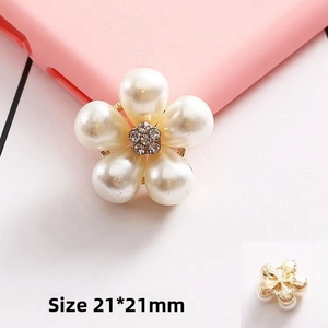 Macro view of 21x21mm five-petal pearl flower accessory with rhinestone center