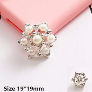 Detailed close-up of a 19x19mm silver snowflake flower charm with pearls and rhinestones