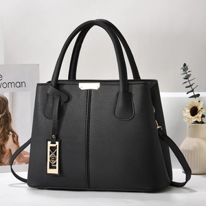Classic black pebbled leather handbag for women featuring elegant gold metal hardware