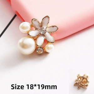 Macro detail of 18x19mm pearl floral DIY phone case charm with back metal clip structure