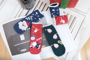 Three pairs of thick cotton Christmas socks for kids in deep blue, red and green colors