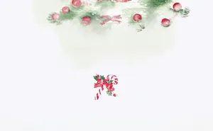 Detail of Christmas gift box packaging with Merry Christmas greeting and festive icons