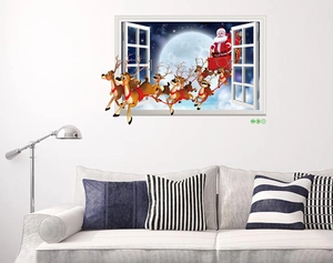 3D Christmas wall sticker featuring Santa Claus on a sleigh flying out of a faux window