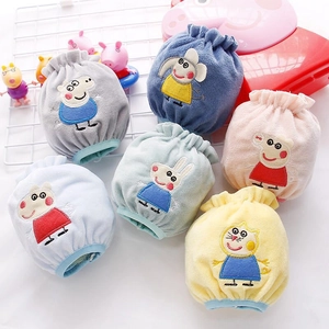 Top view of six colorful plush cartoon animal storage bags on a white metal grid