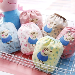 Detail of colorful cotton underwear with Peppa Pig embroidery in a white wire basket