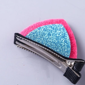 Sparkly pink cat ear hair clip for girls with blue glitter accents on felt fabric