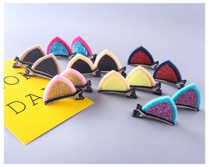 Multi-colored sequin cat ear hair clips for girls with fuzzy fabric and glitter finish