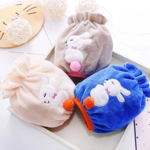 Plush animal drawstring bags in beige blue and grey with rabbit embroidery and fur ball tail