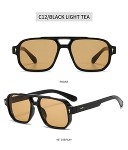 Detailed view of square vintage sunglasses with black frames and gold arrow metal accents