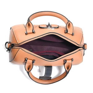 Top view of spacious interior compartment in brown faux leather Boston handbag