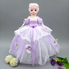 Detailed view of doll in purple lace princess dress with intricate floral embroidery
