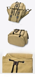 Macro detail of khaki canvas texture and leather strap buckle on vintage backpack