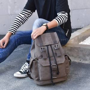 Retro canvas backpack with leather straps for travel and casual outdoor adventures