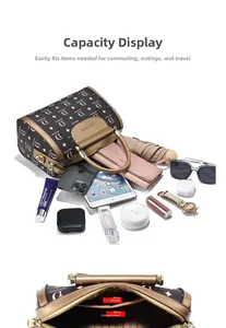 Detailed view of spacious interior storage and tiered compartments of the retro floral handbag