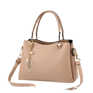 Fashionable beige tote bag with litchi texture and golden leaf charm for women
