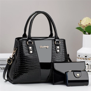 Three-piece black patent leather handbag set with croc-embossed texture and gold hardware