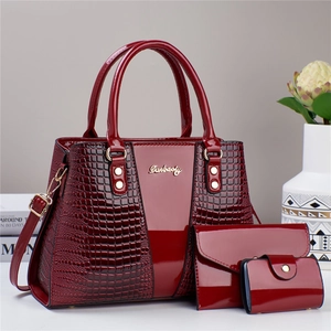 Three-piece red glossy crocodile pattern handbag set with crossbody bag and wallet