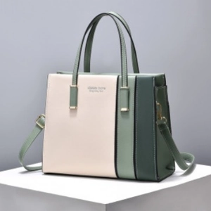 Chic tricolor patchwork tote bag in pink and green with top handles and shoulder strap