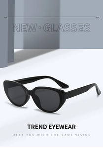 Detail of premium black cat-eye sunglasses with thick frame and dark lenses