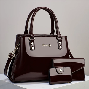 Deep burgundy glossy patent leather 3-piece handbag set with tote and wallet