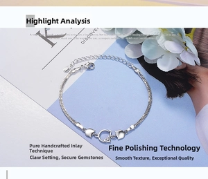 Close-up of S925 silver double-strand bracelet with cute cat charms and lobster clasp