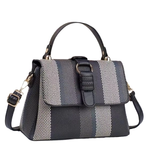 Women's chic striped woven handbag with gold hardware and adjustable crossbody strap