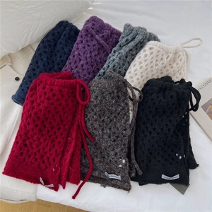 Gonne a portafoglio in maglia traforata in sette colori con dettagli a laccio