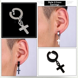 Detail of black and silver stainless steel cross dangle earrings with non-pierced clips