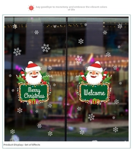 Christmas window decals showing Santa and snowflakes on a glass door with festive night lights