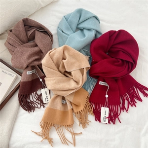 Thick 100% lambswool scarf with fringe and herringbone pattern in four elegant colors