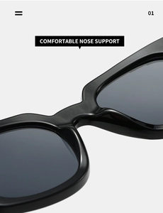 Macro detail of comfortable integrated nose support on black square frame sunglasses