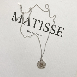 Close-up of S925 sterling silver coin pendant necklace showing the 1988 hallmark