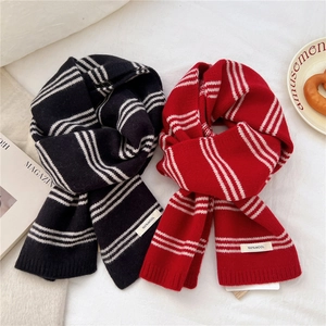 Striped wool scarf in black and red knit with 100% wool label for winter warmth