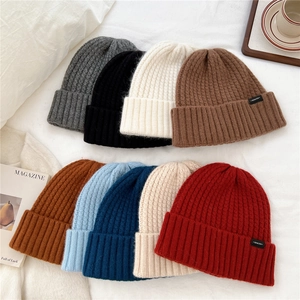 Unisex wool blend ribbed knit beanie hats in multiple colors for winter warmth