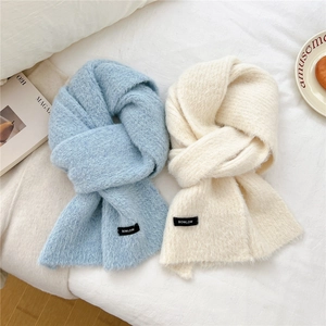 Thick soft wool blend knit scarves in light blue and beige with woven label detail