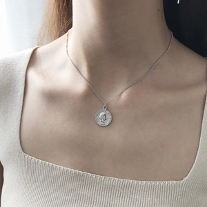 925 sterling silver coin necklace featuring a vintage Swiss pendant on a delicate chain