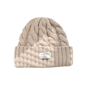 Oatmeal thick knit 100% wool beanie hat for women featuring a cozy folded cuff design