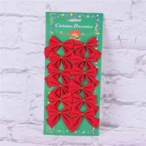 Set of 12 red velvet Christmas bows for tree decorations on green display card