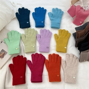 Colorful knit winter gloves for women with ribbed cuffs and warm thermal lining