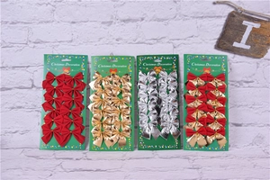 Set of 48 red flocking and metallic Christmas bows on festive green backing cards