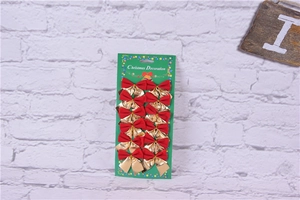Set of 12 red and gold flocked mini Christmas bows on green display card with brick background