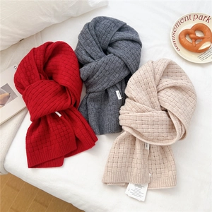 Thick waffle knit wool scarf in red, grey, and beige with a soft, warm thermal texture