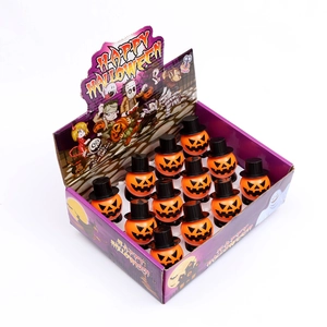 Set of 12 Halloween wind-up jumping pumpkin toys in a cartoon display box